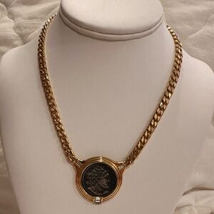 vintage unbranded gold tone necklace a faux Roman coin pendant possibly Apollo